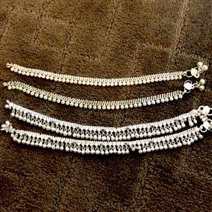 Set of 2 anklets. 2 anklets in each set of silver toned color.